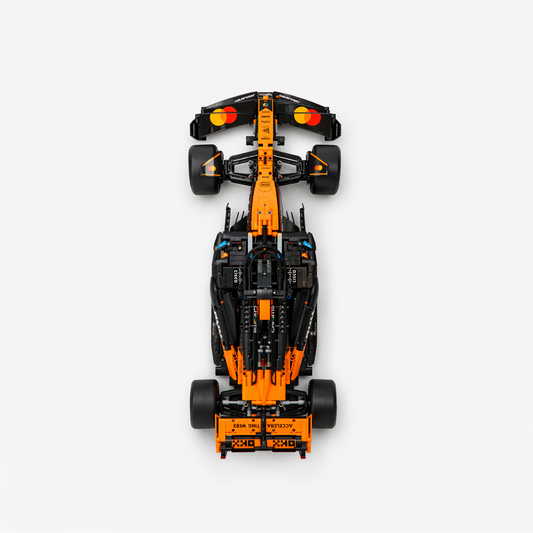 Full grid of LEGO Technic F1 cars displayed together on a wall