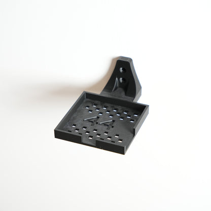LEGO F1 driver helmet mounted on the wall, side detail