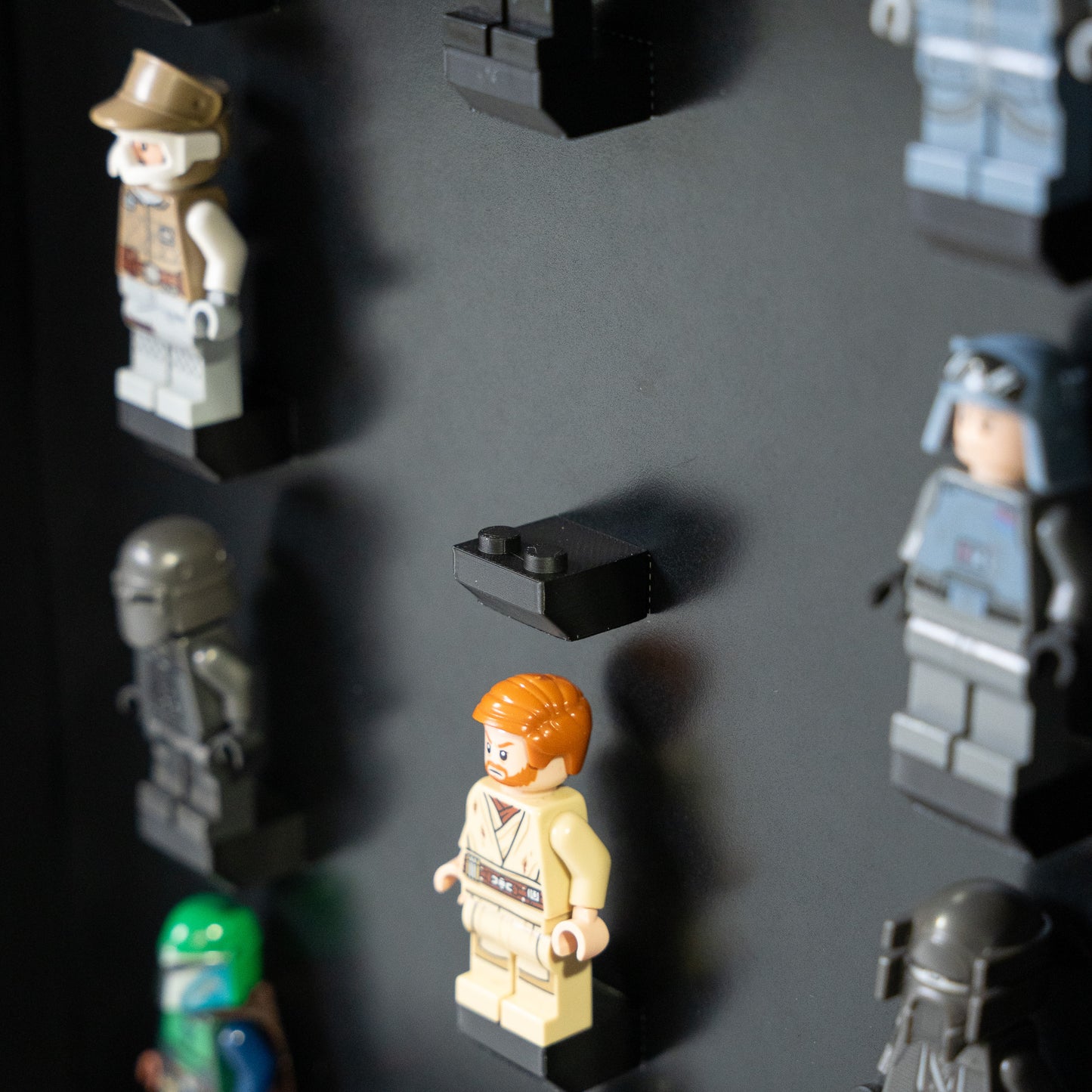 Wall-mounted LEGO minifigure display case, angled view
