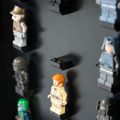 Wall-mounted LEGO minifigure display case, angled view