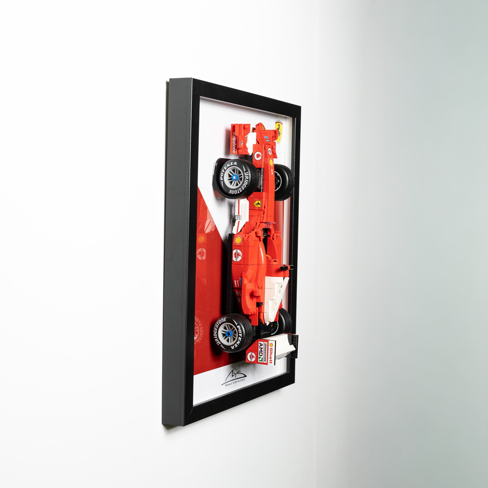 Side angle of the framed LEGO Icons F1 display