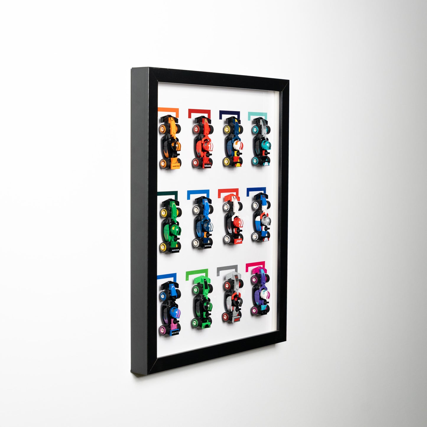 LEGO F1 race car display case mounted on the wall