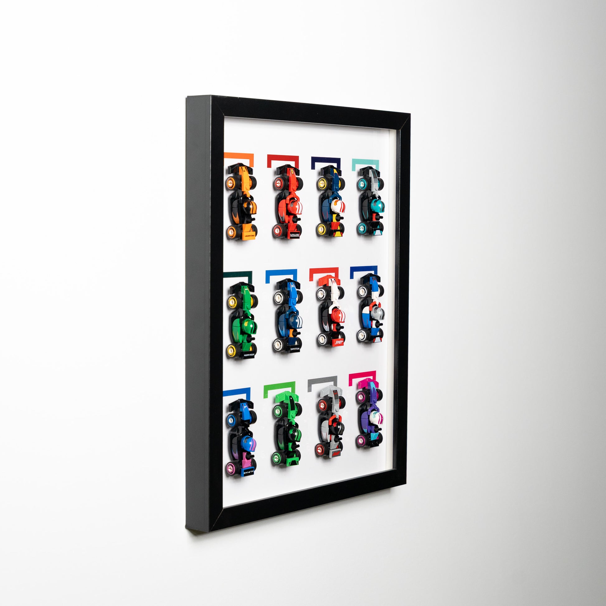 LEGO F1 race car display case mounted on the wall