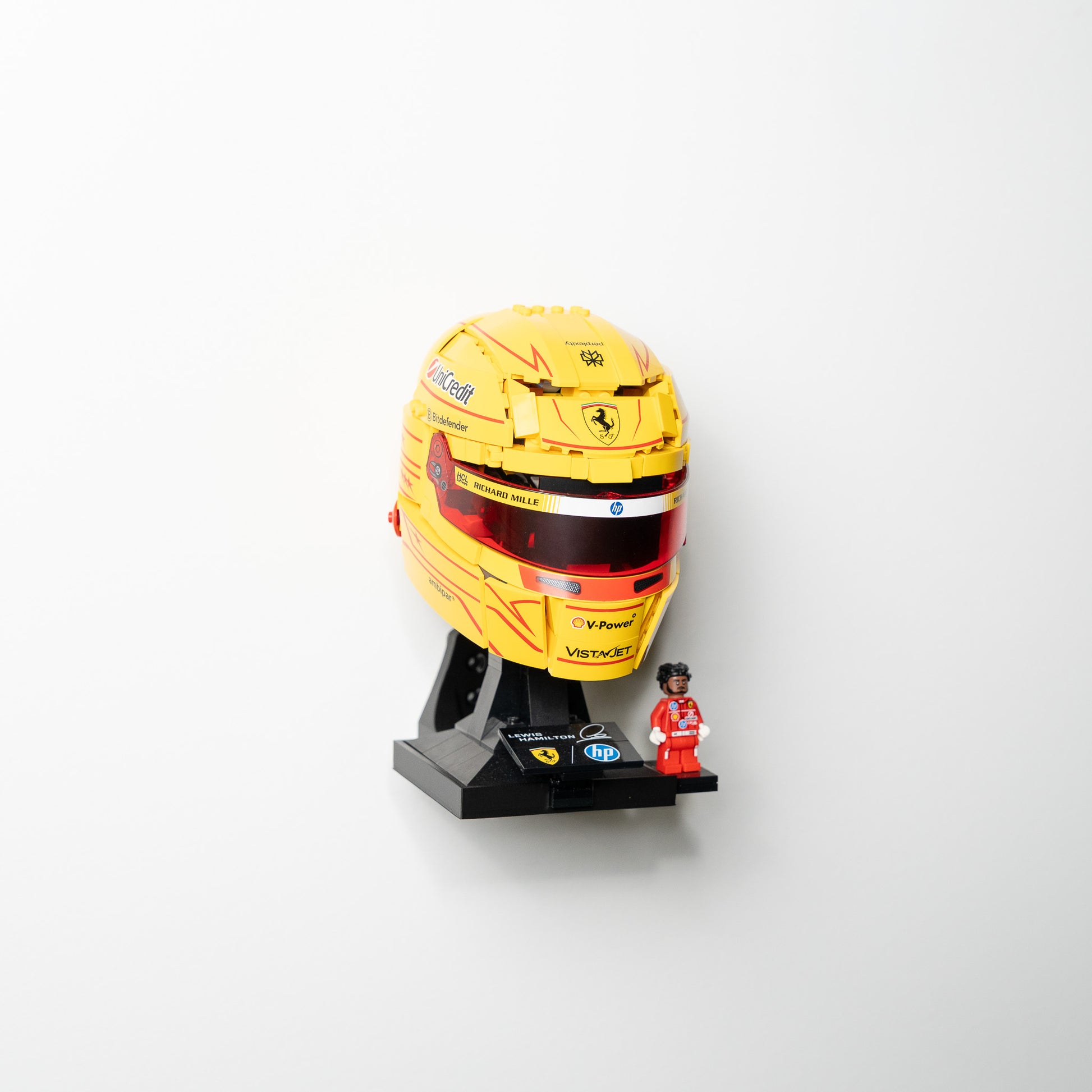 LEGO F1 driver helmet wall-mounted with a floating effect